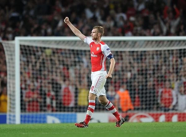 Per Mertesacker's Celebration: Arsenal FC Secures Champions League Spot against Besiktas