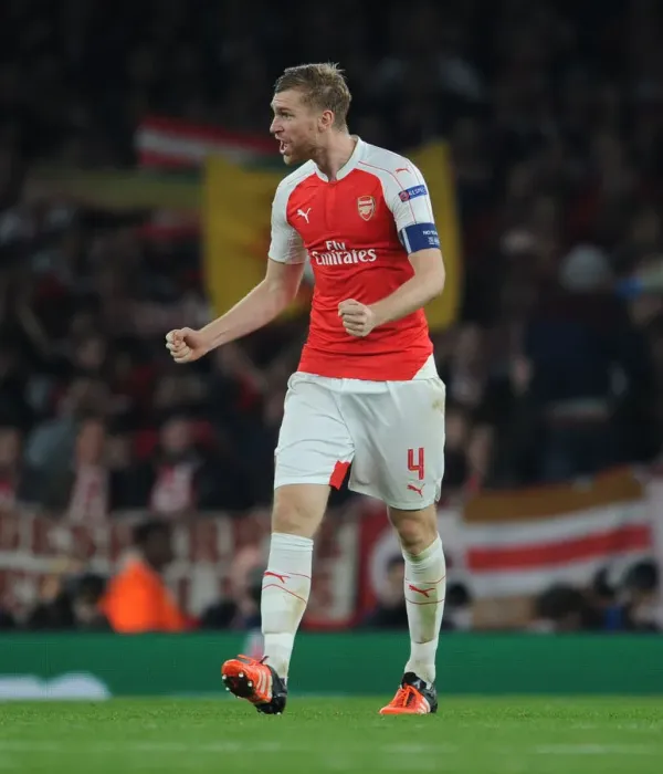 Framed Print : Per Mertesacker's Euphoric Moment: Arsenal's Victory Celebration vs. FC Bayern Munich, UEFA Champions League 2015 / 16 Framed Print : Per Mertesacker's Euphoric Moment: Arsenal's Victory Celebration vs. FC Bayern Munich, UEFA Champions League 2015 / 16