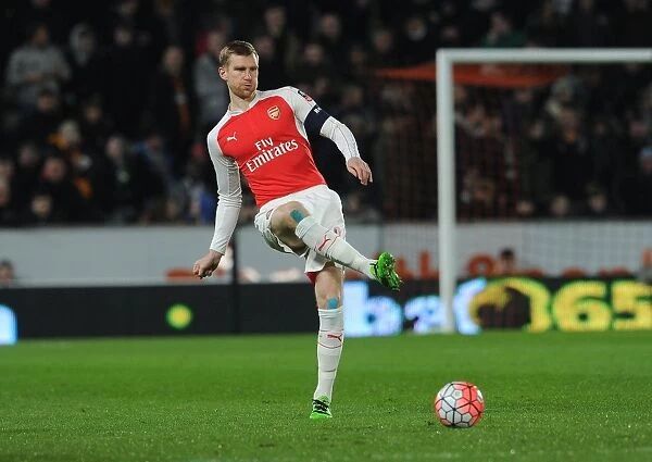 Per Mertesacker's Focus: Arsenal's Defender in FA Cup Fifth Round Replay against Hull City
