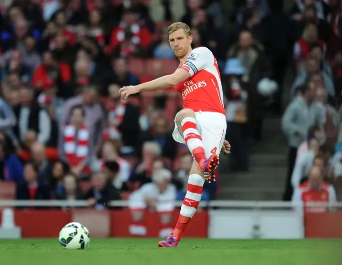 Framed Print : Per Mertesacker's Intense Focus: Arsenal's Final Premier League Showdown Against Swansea City (2014 / 15) Framed Print : Per Mertesacker's Intense Focus: Arsenal's Final Premier League Showdown Against Swansea City (2014 / 15)