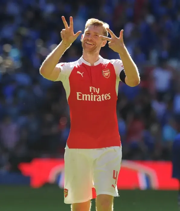 Framed Print : Per Mertesacker's Triumph: Arsenal Celebrates Community Shield Victory over Chelsea Framed Print : Per Mertesacker's Triumph: Arsenal Celebrates Community Shield Victory over Chelsea