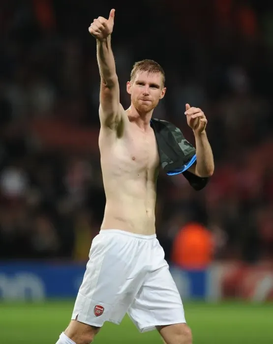 Framed Print : Per Mertesacker's Triumph: Arsenal's Champions League Victory over Napoli (2013) Framed Print : Per Mertesacker's Triumph: Arsenal's Champions League Victory over Napoli (2013)