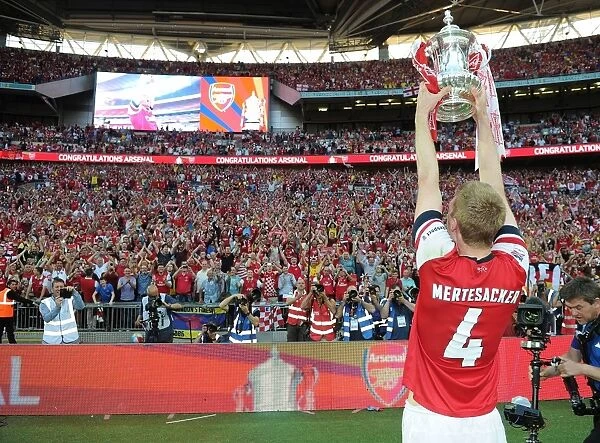 Per Mertesacker's Triumph: Arsenal's FA Cup Victory at Wembley