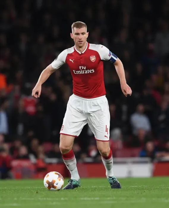 Framed Print : Per Mertesacker's Unwavering Concentration: Arsenal's Europa League Showdown Against 1. FC Köln Framed Print : Per Mertesacker's Unwavering Concentration: Arsenal's Europa League Showdown Against 1. FC Köln