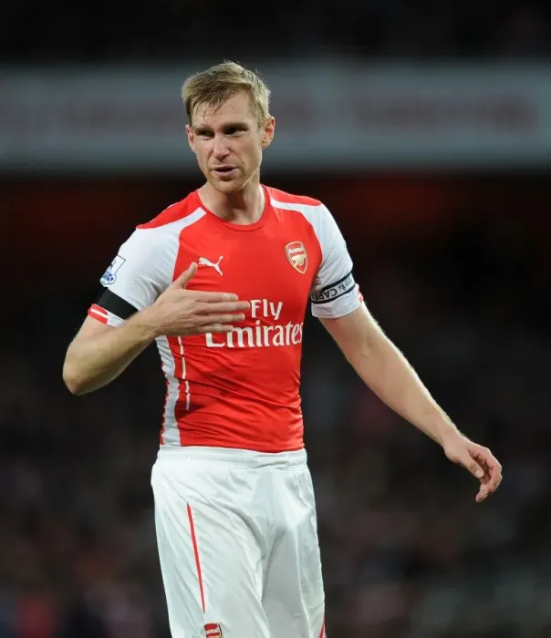 Framed Print : Per Mertesacker's Unwavering Focus: Arsenal's Triumph Over Burnley (2014 / 15) Framed Print : Per Mertesacker's Unwavering Focus: Arsenal's Triumph Over Burnley (2014 / 15)