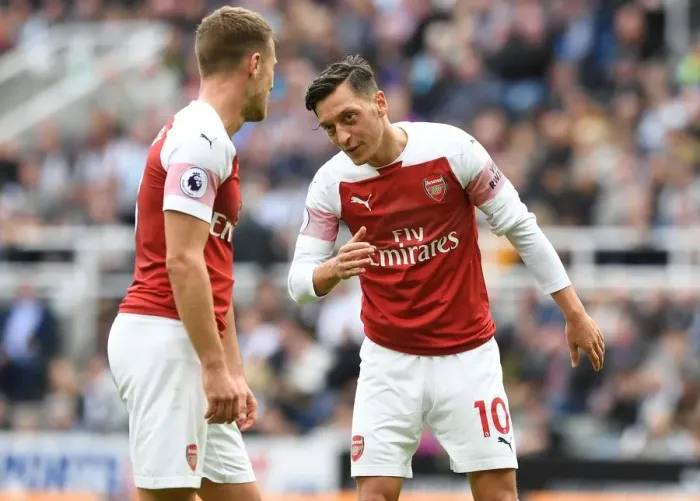 Framed Print : Mesut Ozil and Aaron Ramsey in Deep Conversation: Newcastle United vs. Arsenal FC, 2018-19 Premier League
