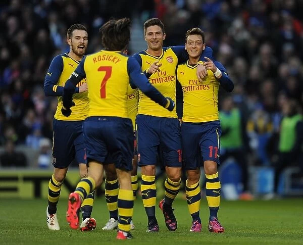 Mesut Ozil, Aaron Ramsey, Tomas Rosicky, and Olivier Giroud Celebrate Arsenal's Goals Against Brighton & Hove Albion in FA Cup Fourth Round