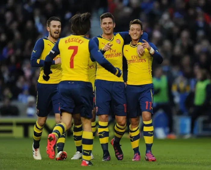 Framed Print : Mesut Ozil, Aaron Ramsey, Tomas Rosicky, and Olivier Giroud Celebrate Arsenal's Goals Against Brighton & Hove Albion in FA Cup Fourth Round Framed Print : Mesut Ozil, Aaron Ramsey, Tomas Rosicky, and Olivier Giroud Celebrate Arsenal's Goals Against Brighton & Hove Albion in FA Cup Fourth Round