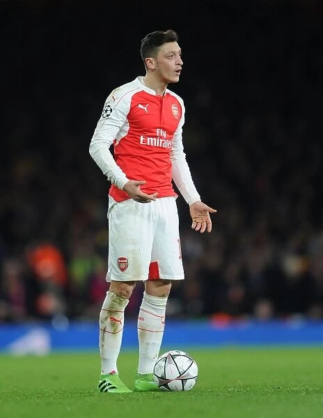 Mesut Ozil in Action: Arsenal FC vs. FC Barcelona - UEFA Champions League 2015 / 16 Round of 16, First Leg