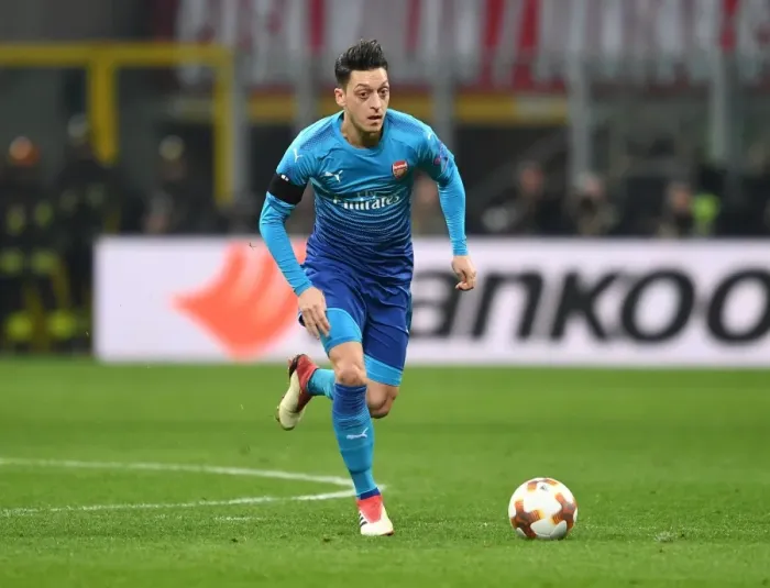 Framed Print : Mesut Ozil in Action: Arsenal vs. AC Milan, UEFA Europa League (First Leg)