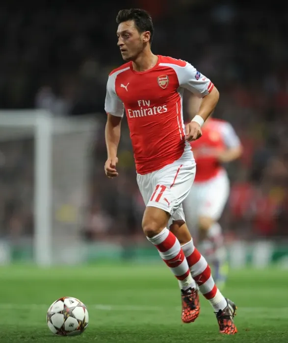 Framed Print : Mesut Ozil in Action: Arsenal vs. Besiktas, UEFA Champions League (2014) Framed Print : Mesut Ozil in Action: Arsenal vs. Besiktas, UEFA Champions League (2014)