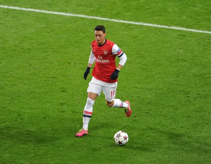 Framed Print : Mesut Ozil in Action: Arsenal vs. Olympique de Marseille, UEFA Champions League (2013)