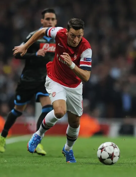 Framed Print : Mesut Ozil in Action: Arsenal vs SSC Napoli, UEFA Champions League, 2013