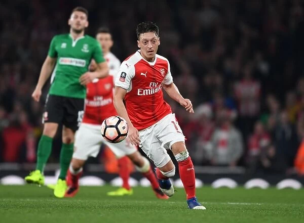 Mesut Ozil in Action: Arsenal's Star Performance at FA Cup Quarter-Final vs. Lincoln City