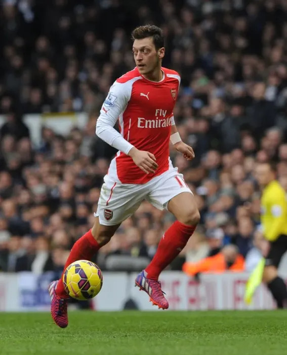 Framed Print : Mesut Ozil: In Action Against Tottenham in the 2014-15 Premier League