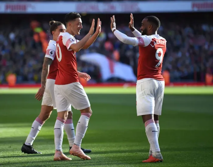 Framed Print : Mesut Ozil and Alexandre Lacazette Celebrate Goals: Arsenal's Winning Moment Against Watford (2018-19)