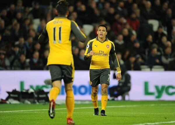Mesut Ozil and Alexis Sanchez Celebrate Arsenal's First Goal Against West Ham United (2016-17)