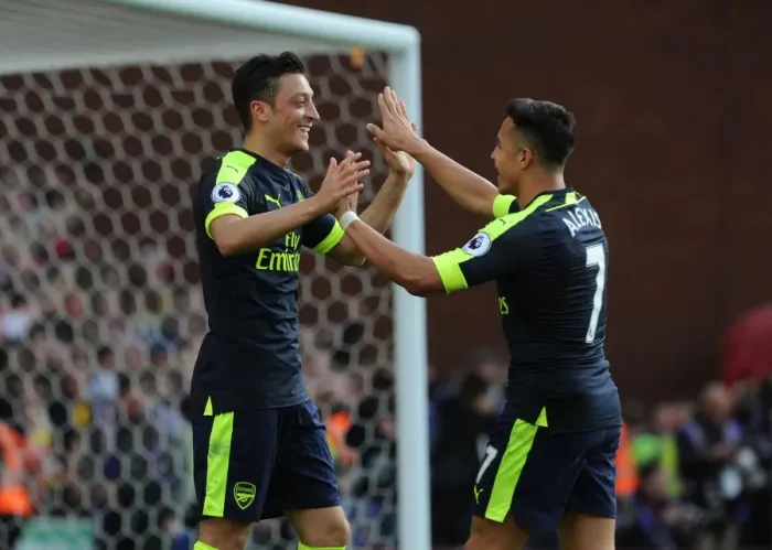 Framed Print : Mesut Ozil and Alexis Sanchez Celebrate Goals: Stoke City vs Arsenal, Premier League 2016-17 Framed Print : Mesut Ozil and Alexis Sanchez Celebrate Goals: Stoke City vs Arsenal, Premier League 2016-17