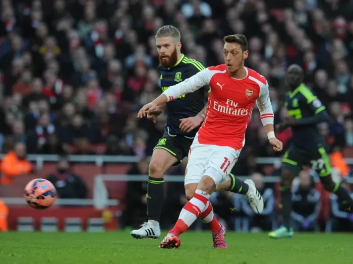 Framed Print : Mesut Ozil (Arsenal) Adam Clayton (Middlesbrough). Arsenal 2: 0 Middlesbrough. FA Cup 5th Round