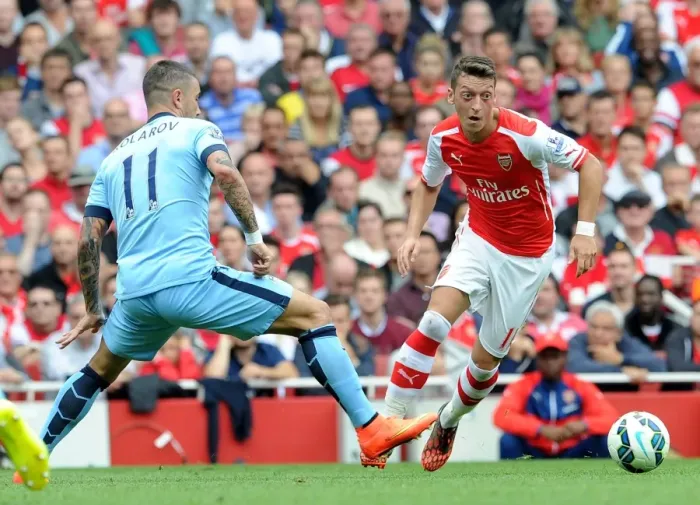 Framed Print : Mesut Ozil (Arsenal) Alexander Kolarov (Man City). Arsenal 2: 2 Manchester City. Barclays