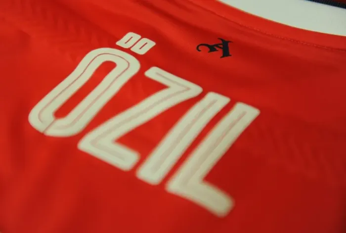 Framed Print : Mesut Ozil in the Arsenal Changing Room Before Arsenal vs Paris Saint-Germain - UEFA Champions League 2016-17