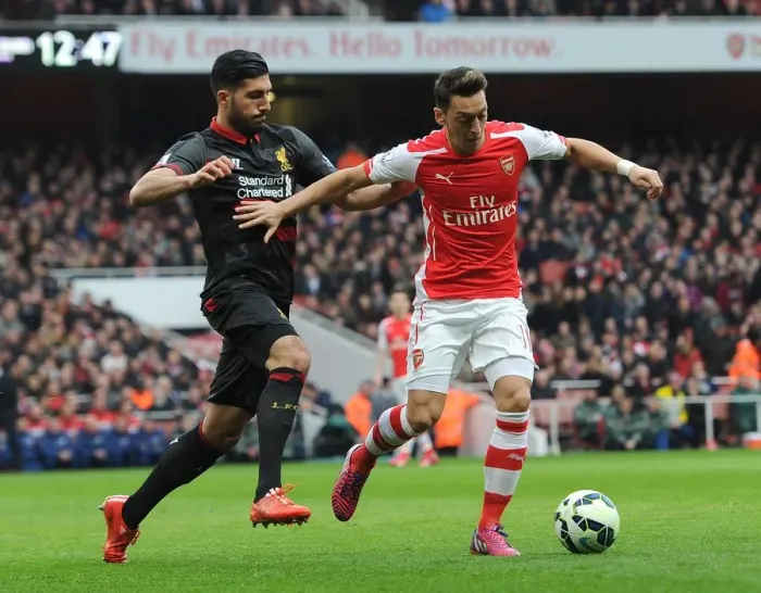 Framed Print : Mesut Ozil (Arsenal) Emre Can (Liverpool). Arsenal 4: 1 Liverpool. Barclays Premier League