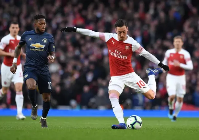 Framed Print : Mesut Ozil (Arsenal) Fred (Man Utd)