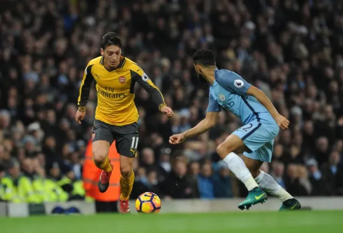 Framed Print : Mesut Ozil (Arsenal) Gael Clichy (Man City). Manchester City 2: 1 Arsenal. Premier League Framed Print : Mesut Ozil (Arsenal) Gael Clichy (Man City). Manchester City 2: 1 Arsenal. Premier League