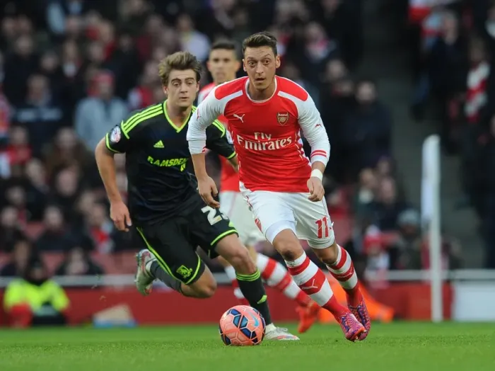 Framed Print : Mesut Ozil (Arsenal) Patrick Bamford (Middlesbrough). Arsenal 2: 0 Middlesbrough. FA Cup 5th Round
