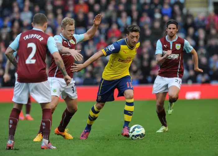 Framed Print : Mesut Ozil (Arsenal). Scott Arfield and Kieran Trippier (Burnley). Burnley 0: 1 Arsenal Framed Print : Mesut Ozil (Arsenal). Scott Arfield and Kieran Trippier (Burnley). Burnley 0: 1 Arsenal