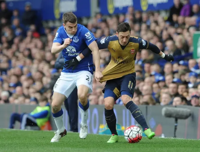 Framed Print : Mesut Ozil (Arsenal) Seamus Coleman (Everton)