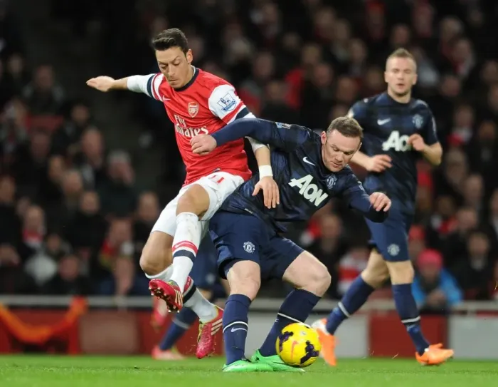 Framed Print : Mesut Ozil (Arsenal) Watne Rooney (Man Utd). Arsenal 0: 0 Manchester United. Barclays Premier League