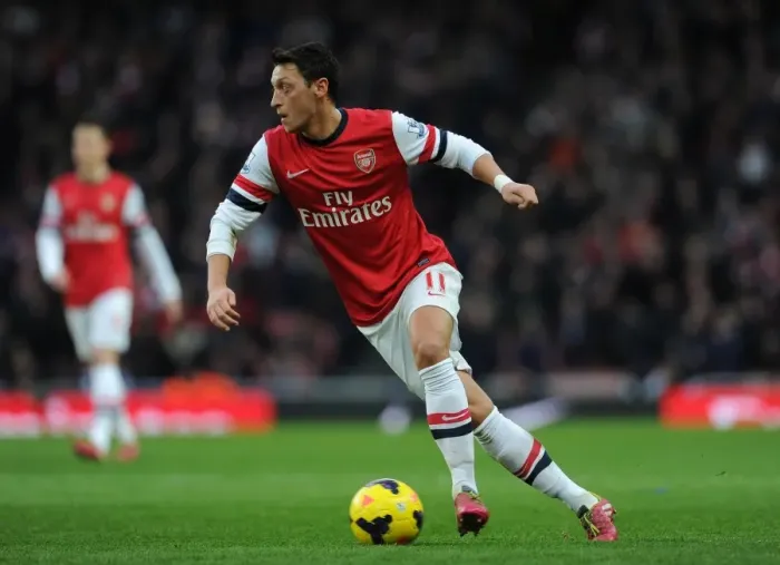 Framed Print : Mesut Ozil: Arsenal's Star Midfielder in Action Against Fulham, Premier League 2013-14
