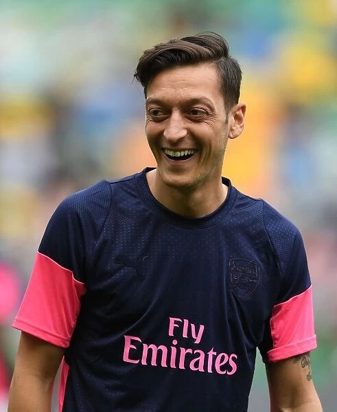 Mesut Ozil: Arsenal's Star Player Gears Up for Europa League Showdown Against Sporting Lisbon
