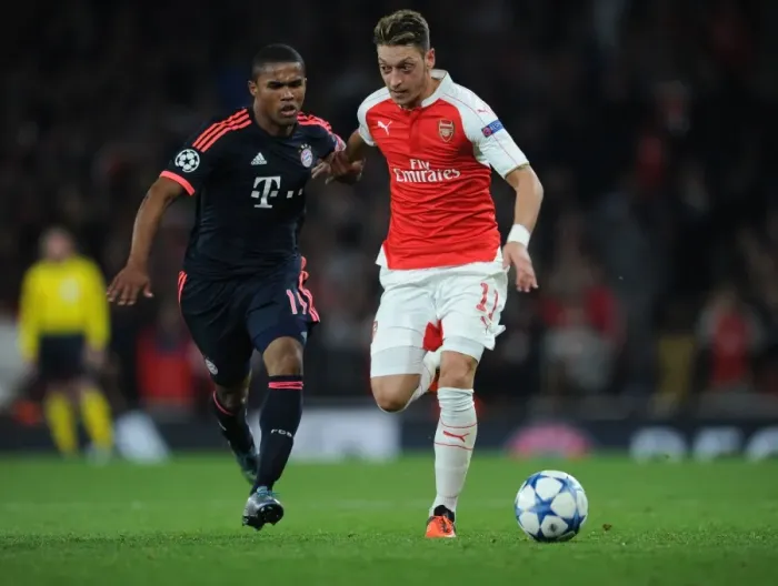 Framed Print : Mesut Ozil Breaks Past Douglas Costa: Arsenal FC vs. FC Bayern Munchen, UEFA Champions League, 2015