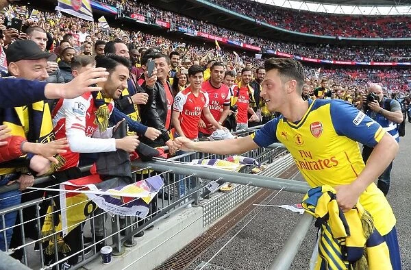 Mesut Ozil Celebrates FA Cup Victory with Arsenal Fans (2015)