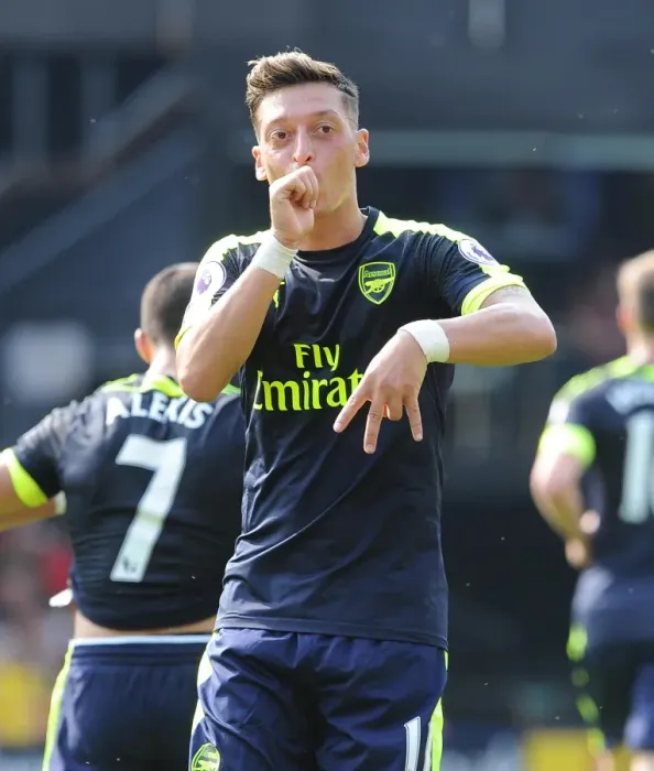 Framed Print : Mesut Ozil celebrates scoring Arsenals 3rd goal. Watford 1: 3 Arsenal. Premier League Framed Print : Mesut Ozil celebrates scoring Arsenals 3rd goal. Watford 1: 3 Arsenal. Premier League