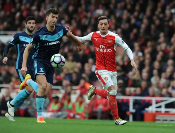 Framed Print : Mesut Ozil Chases Down Daniel Ayala: Intense Moment from Arsenal vs. Middlesbrough (2016-17) Framed Print : Mesut Ozil Chases Down Daniel Ayala: Intense Moment from Arsenal vs. Middlesbrough (2016-17)