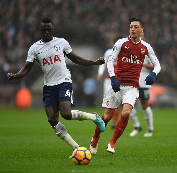Mesut Ozil Closes Down Davison Sanchez: Intense Battle in Tottenham Hotspur vs Arsenal Premier League Clash