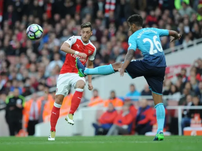 Framed Print : Mesut Ozil Dodges Kyle Naughton: Thrilling Moment from Arsenal vs Swansea City, Premier League 2016-17