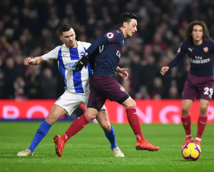 Framed Print : Mesut Ozil Faces Off Against Pascal Gross: Brighton vs. Arsenal, Premier League 2018-19