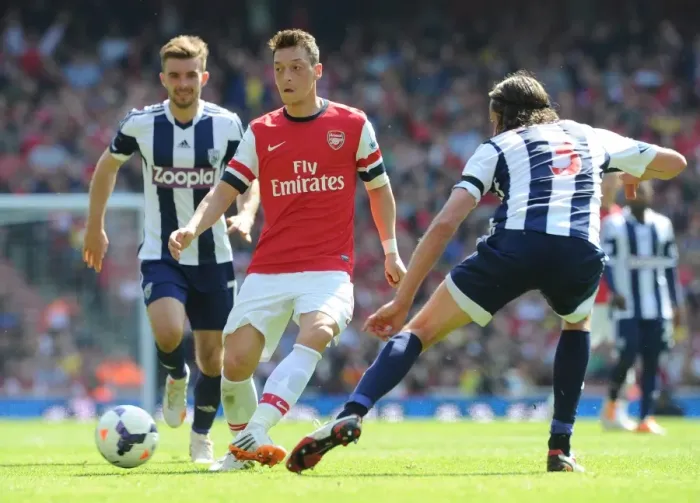 Framed Print : Mesut Ozil Faces Pressure from Morrison and Olsson during Arsenal vs West Bromwich Albion, Premier League 2013-14
