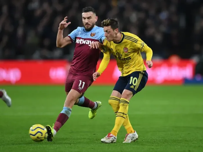 Framed Print : Mesut Ozil Faces Pressure: West Ham United vs. Arsenal FC, Premier League 2019-20 Framed Print : Mesut Ozil Faces Pressure: West Ham United vs. Arsenal FC, Premier League 2019-20