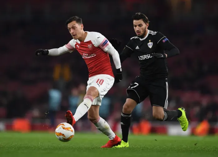 Framed Print : Mesut Ozil Fends Off Abdellah Zoubir: Arsenal vs Qarabag, UEFA Europa League Framed Print : Mesut Ozil Fends Off Abdellah Zoubir: Arsenal vs Qarabag, UEFA Europa League