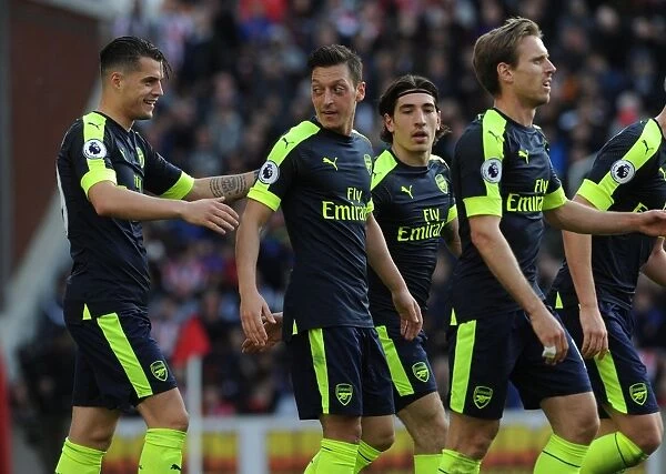 Mesut Ozil and Granit Xhaka Celebrate Arsenal's Goals Against Stoke City