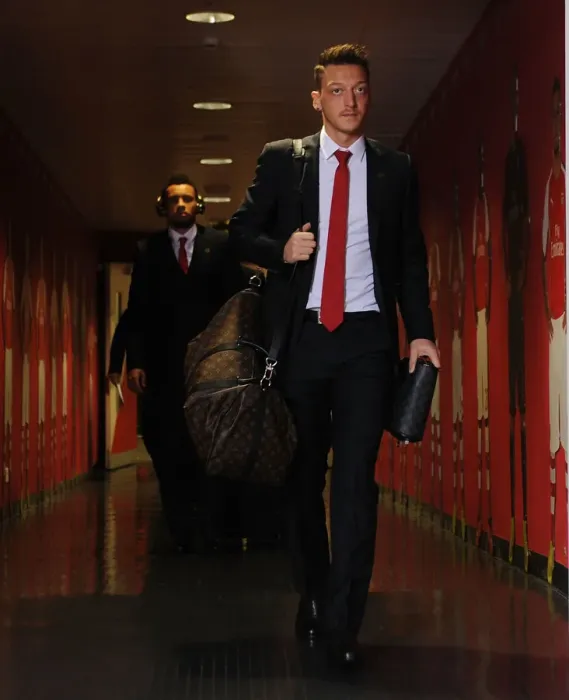 Framed Print : Mesut Ozil Heads to the Arsenal Changing Room before Arsenal vs Stoke City, Premier League 2014-15
