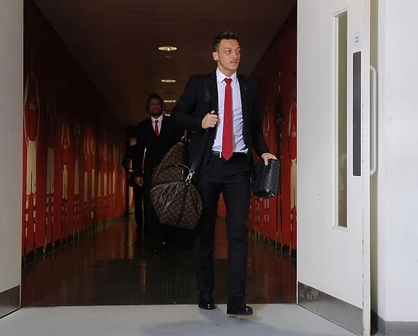Mesut Ozil Heads to the Arsenal Dressing Room before Arsenal vs Stoke City, Premier League 2014-15