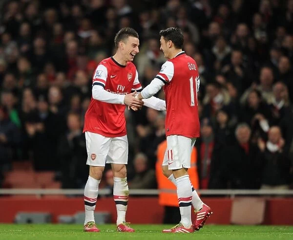 Mesut Ozil and Laurent Koscielny Celebrate Arsenal's Second Goal vs Hull City, 2013-14