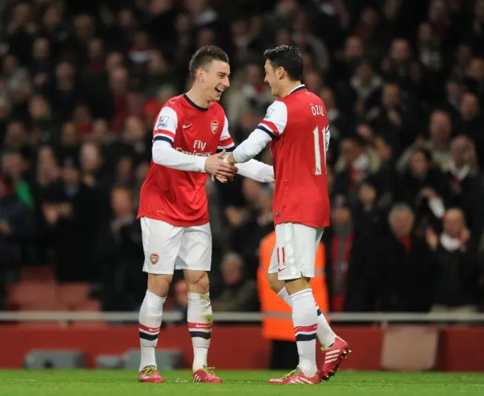 Framed Print : Mesut Ozil and Laurent Koscielny Celebrate Arsenal's Second Goal vs Hull City, 2013-14