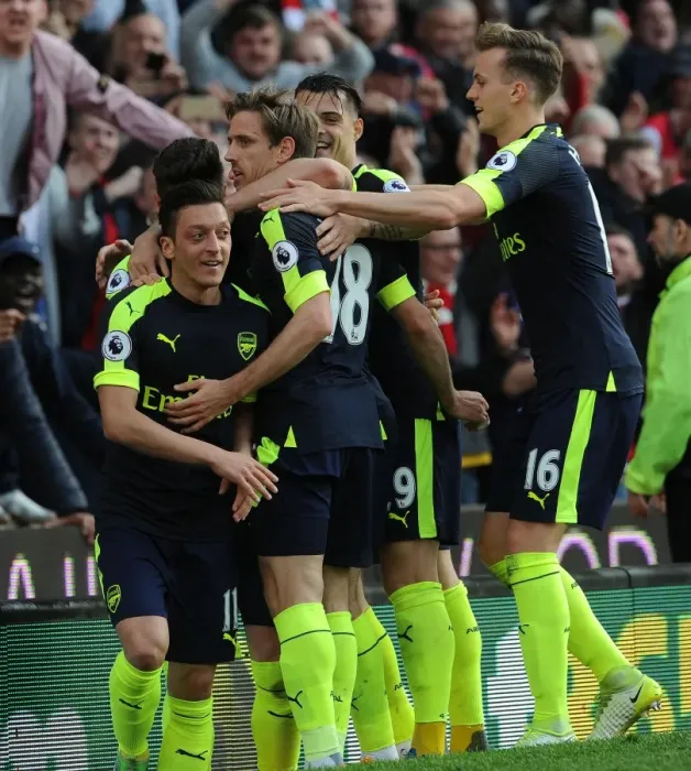 Framed Print : Mesut Ozil, Monreal, Xhaka, and Holding Celebrate Arsenal's Goals Against Stoke City Framed Print : Mesut Ozil, Monreal, Xhaka, and Holding Celebrate Arsenal's Goals Against Stoke City